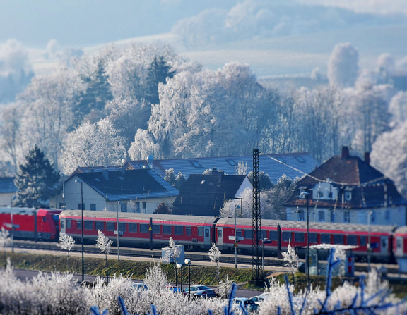 Large canva   train station in snowy landscape